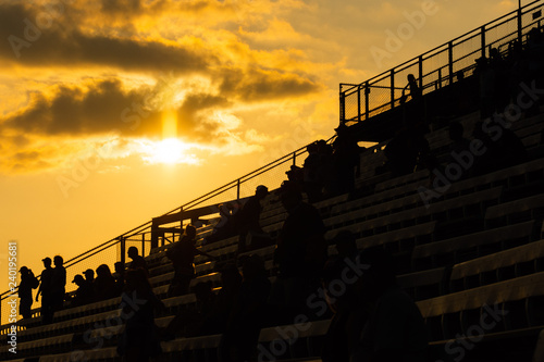 People on bleachers