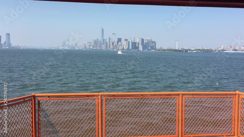 December 20, 2018 : View of Lower Manhattan from The Staten Island Ferry is New York City Department of Transportation runs 5.2 miles between the New York City boroughs of Manhattan and Staten Island.