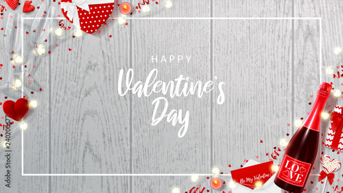 Beautiful banner for Happy Valentine's Day. Vector illustration with top view on realistic bottle of champagne, gift boxes, glasses of champagne, red serpentine and confetti on wooden texture.
