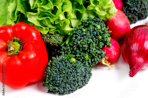 a fresh group of vegetables on white background