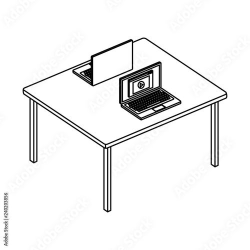 office desk with laptops