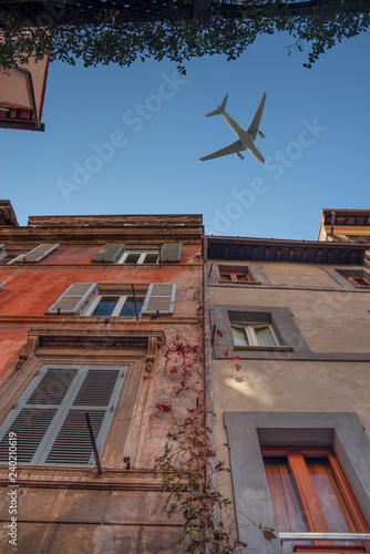  plane flies over the ancient streets of Rome