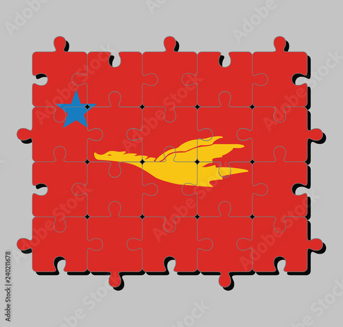 Jigsaw puzzle of New Mon State Party flag, Flag of the golden drake flying on red to star, Concept of Fulfillment or perfection.
