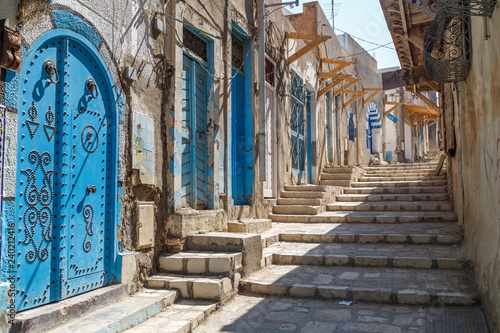 Konstfotografi SOUSSE / TUNISIA - JUNE 2015: Typical street inside the medieval Sousse medina,