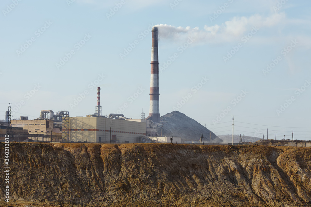 The desert area is polluted with toxic waste near the territory of the copper smelter. The desert area is polluted with toxic waste near the territory of the copper smelter.