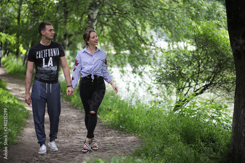 Fototapeta Naklejka Na Ścianę i Meble -  Beautiful young couple on a walk
