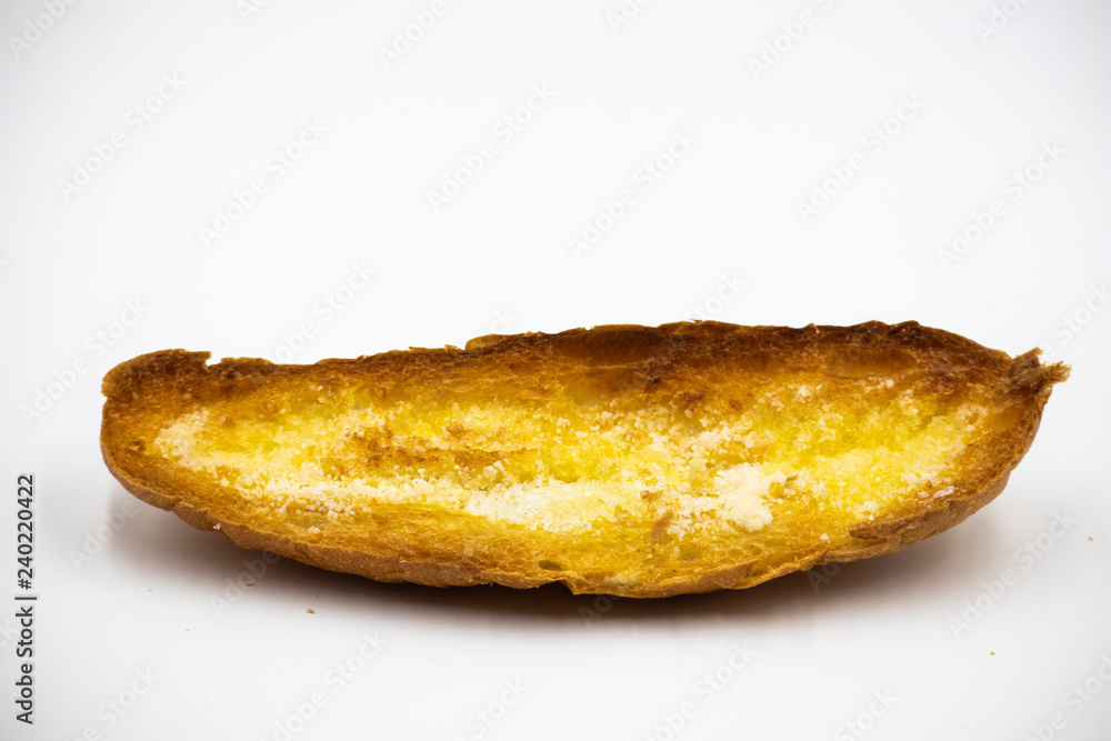 Toasted bread with sugar on white Toasted bread with sugar on white