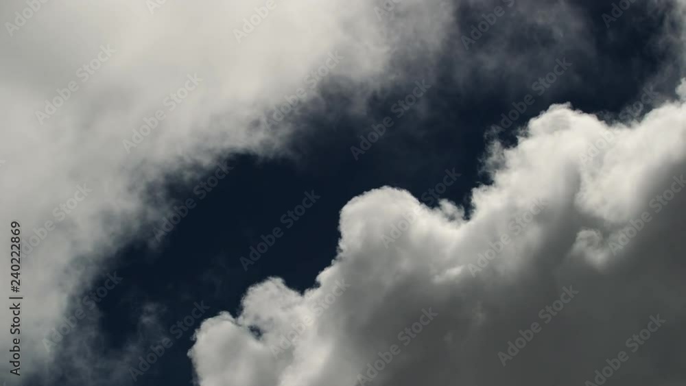 Puffy fluffy white clouds blue sky time lapse motion background. Puffy fluffy white clouds blue sky time lapse motion background.