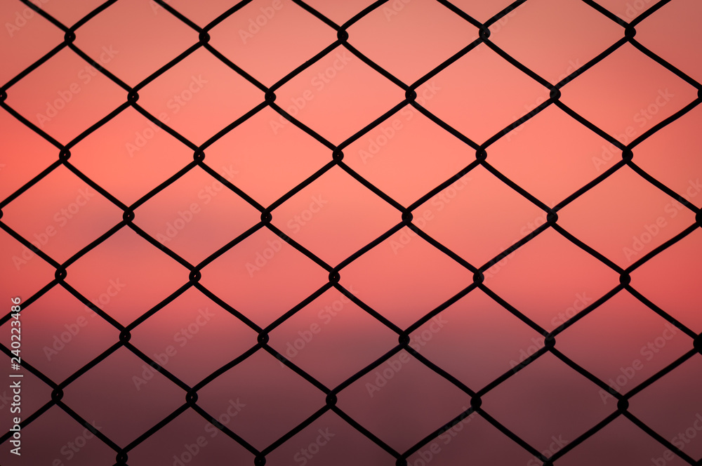 Fototapeta premium Iron metal wire chain link fence