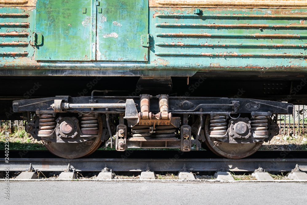 Wheels of the old locomotive and the elements of the drive