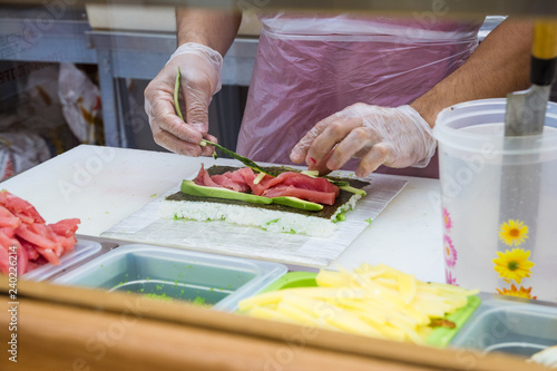 Sushi making at a fast food restaurant