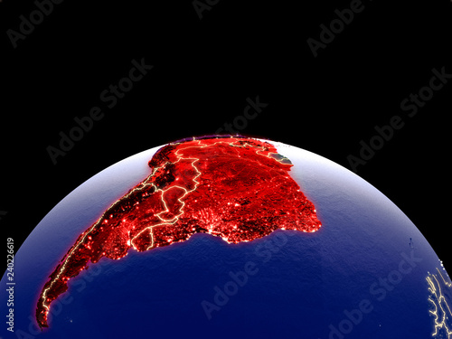 Latin America from space on planet Earth at night with bright city lights. Detailed plastic planet surface with real mountains. photo