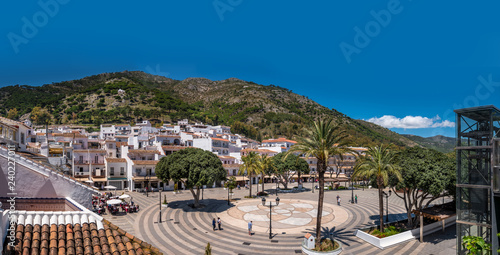 Fotografie, Obraz Panoramic view of the main square of Mijas, a traditional white village in the mountain of the coast of Malaga, Spain