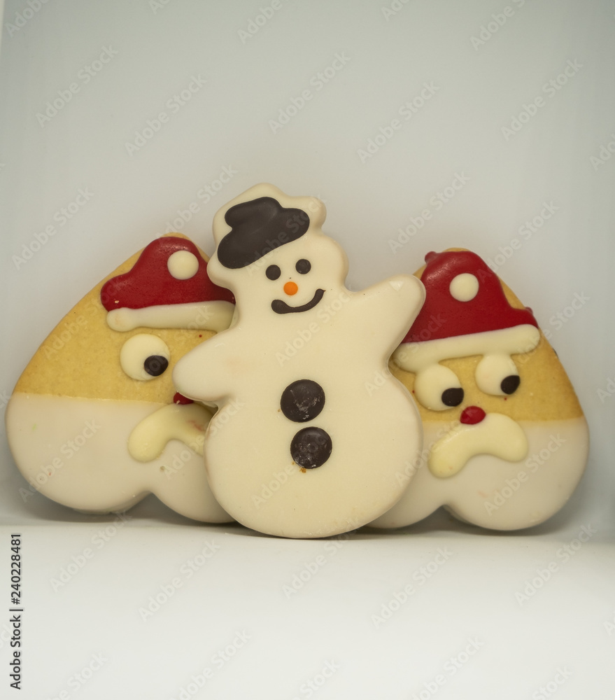 Christmas cookies in the shape of Santa Claus, Christmas tree and snowman. Tasty Christmas cookies. Gift ideas for Christmas. Christmas cookies in the shape of Santa Claus, Christmas tree and snowman. Tasty Christmas cookies. Gift ideas for Christmas.