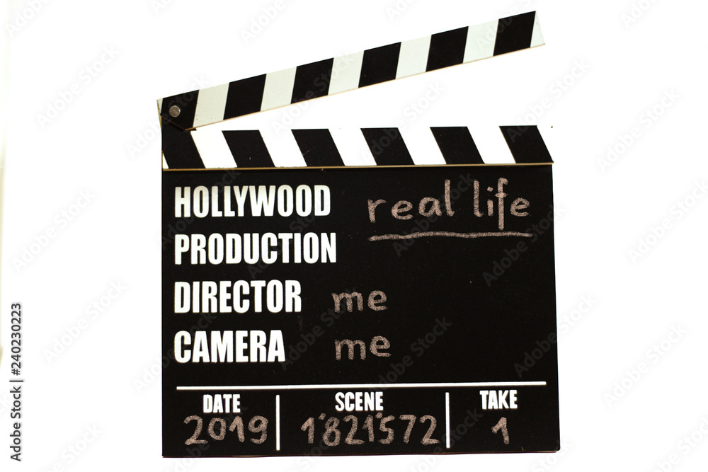Obraz premium Film slate - film clapperboard. Real life.
