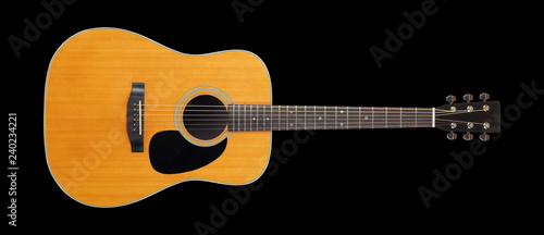 Musical instrument - Front view classic vintage acoustic guitar. Isolated black background