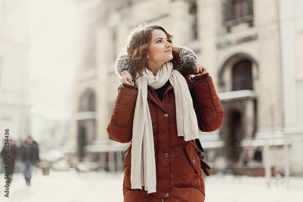 The girl on the street smiles