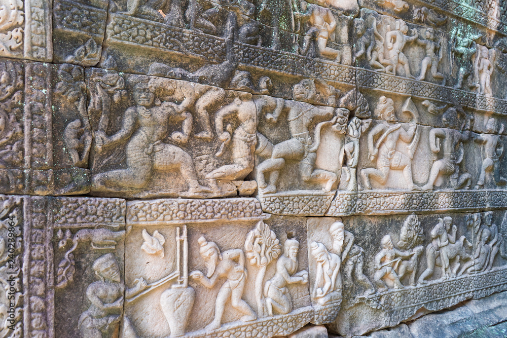 Stone craving on wall in Baphuon temple