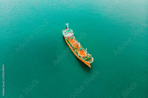 Aerial view of sea freight, Crude oil tanker lpg ngv at industrial estate Thailand / Group Oil tanker ship to Port of Singapore - import export around in the world