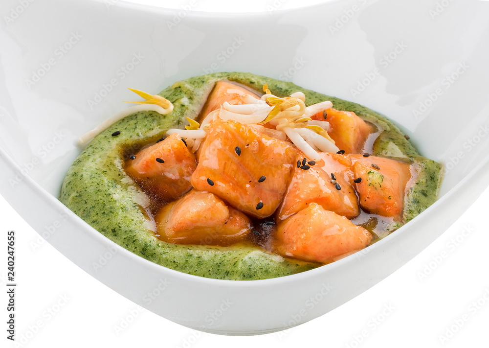 Salmon in sweet and sour sauce with mashed potatoes . Vegetarian dish. On white background Salmon in sweet and sour sauce with mashed potatoes . Vegetarian dish. On white background