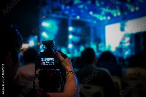 silhouette videographer had been recorded to blurred and bokeh countdown concert., Bangkok, Thailand. © Surachetsh