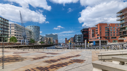 The Magellan Terraces (German: Magellan-Terassen) in the HafenCity quarter of Hamburg, Germany, adjacent to the Traditional Harbor (German: Traditionsschiffhafen or Sandtorhafen). photo