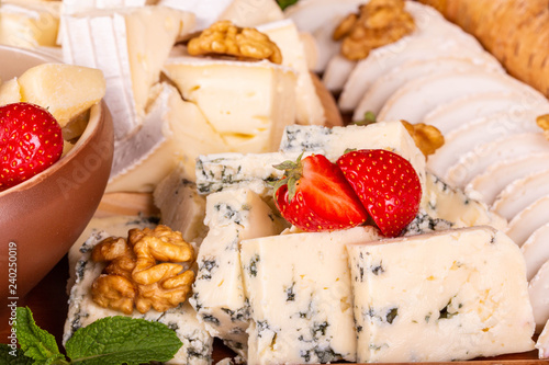 Dorblu cheese with mint, strawberry and nuts