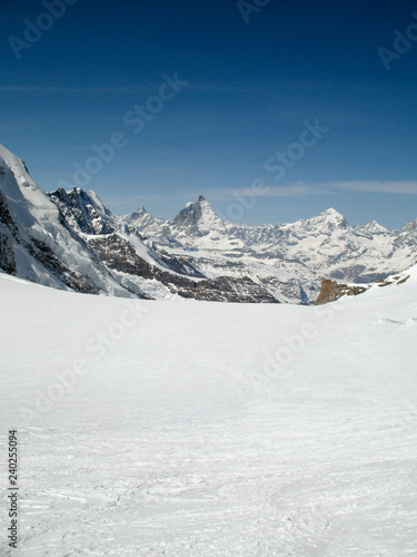 the Monte Rosa mountain range and Matterhorn mountain peak in the Swiss Alps above Zermatt in winter