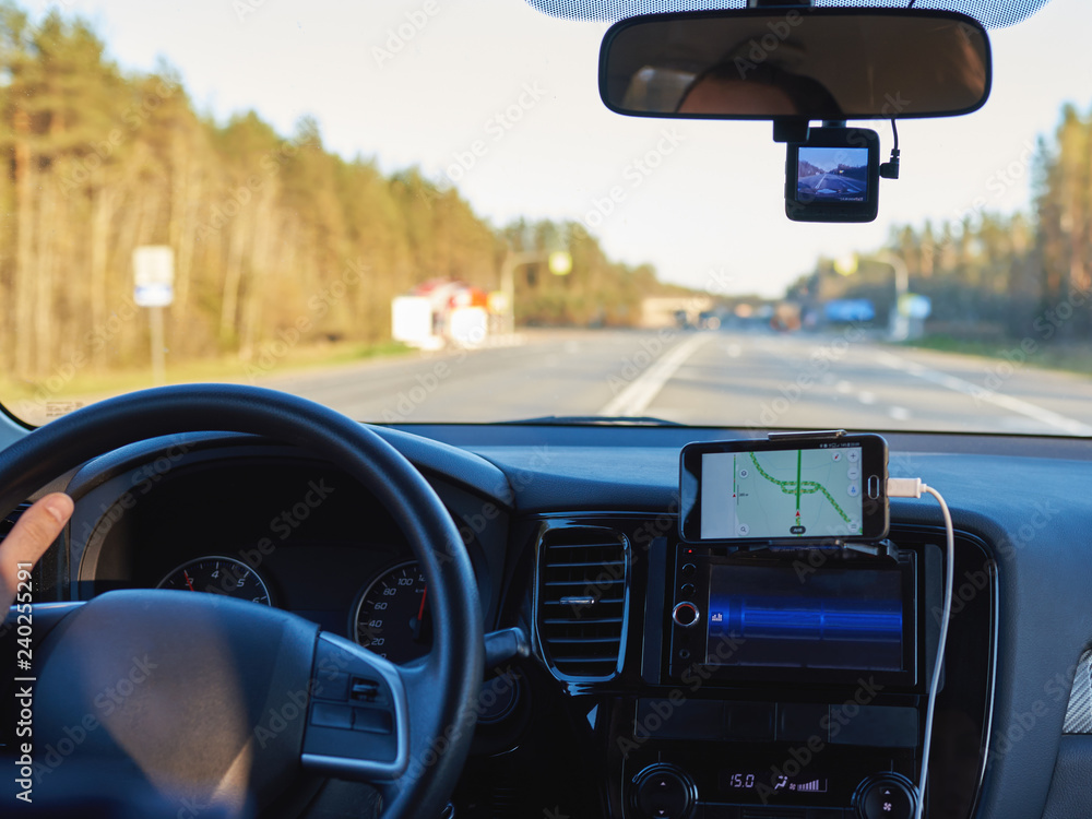 Man driving a car on countryside road. Insight view. Man driving a car on countryside road. Insight view.