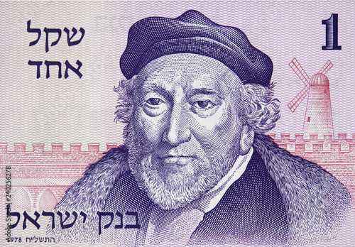 Sir Moses Montefiore face portrait on old Israeli 1 shekel (1980) banknote close up. Founder of Mishkenot Shaananim, the first jewish settlement of outside the Old City of Jerusalem. photo