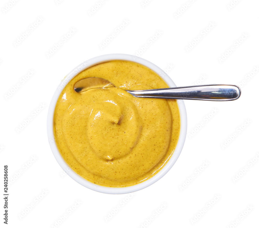 Mustard sauce in ceramic bowl isolated on white background. Top view Mustard sauce in ceramic bowl isolated on white background. Top view