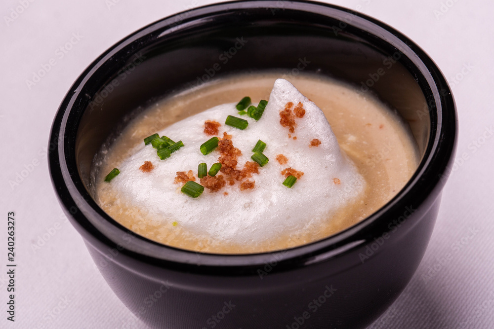Mushroom mousse with air cream and green onions