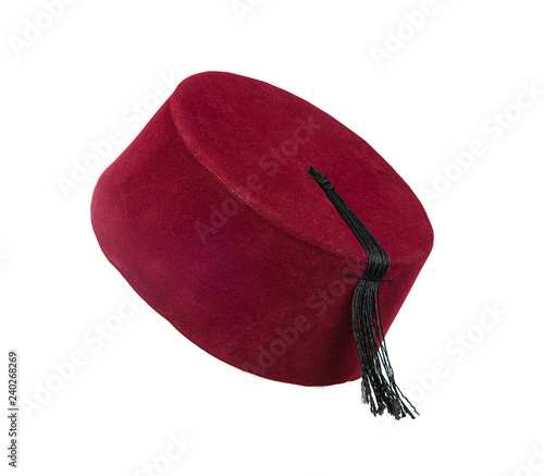 Traditional Turkish hat called fez isolated on white background.  photo