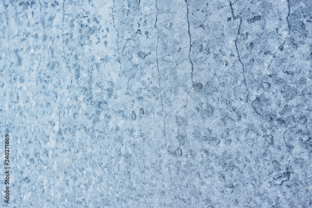Frozen winter window pane coated shiny icy patterns. Frost background, closeup. Extreme north low temperature. Natural ice glass Frozen winter window pane coated shiny icy patterns. Frost background, closeup. Extreme north low temperature. Natural ice glass