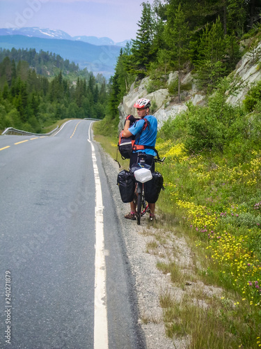 Cyclist on the roads of Norway.