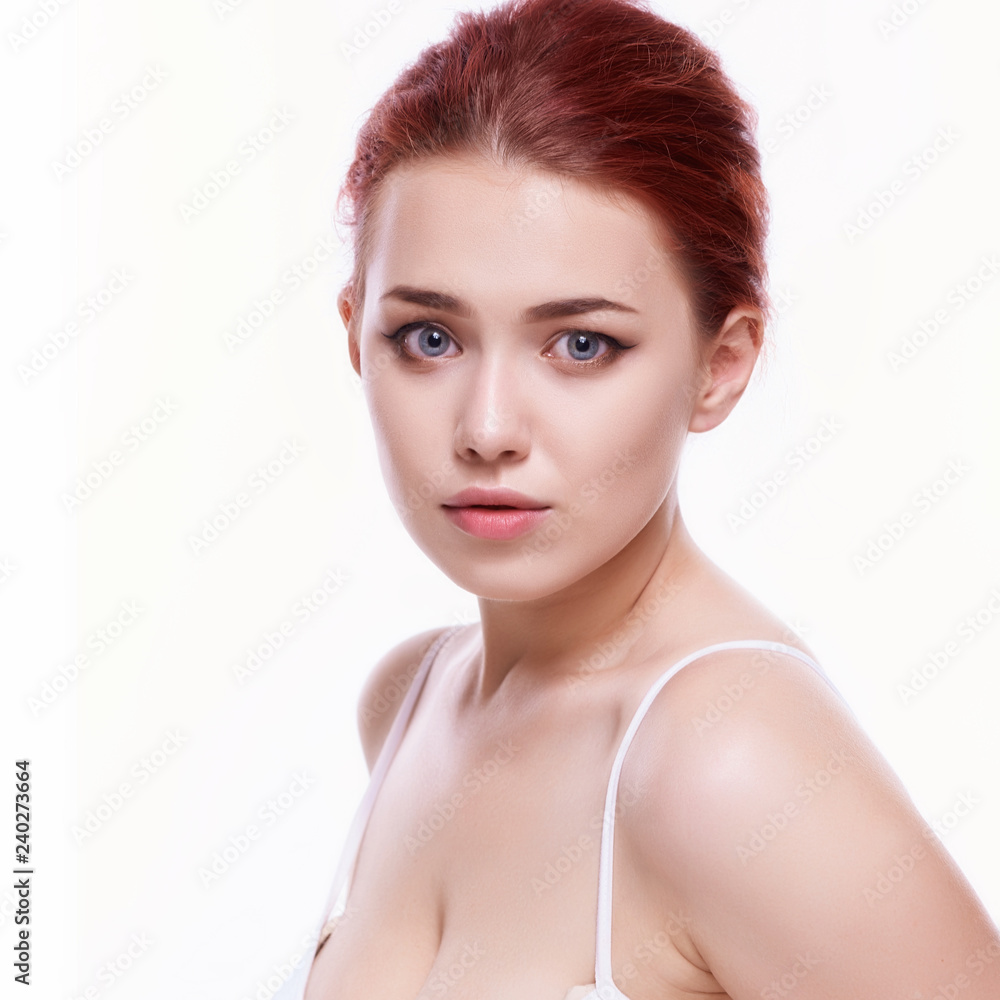 Beautiful face of young adult woman with clean fresh skin - isolated on white Beautiful face of young adult woman with clean fresh skin - isolated on white