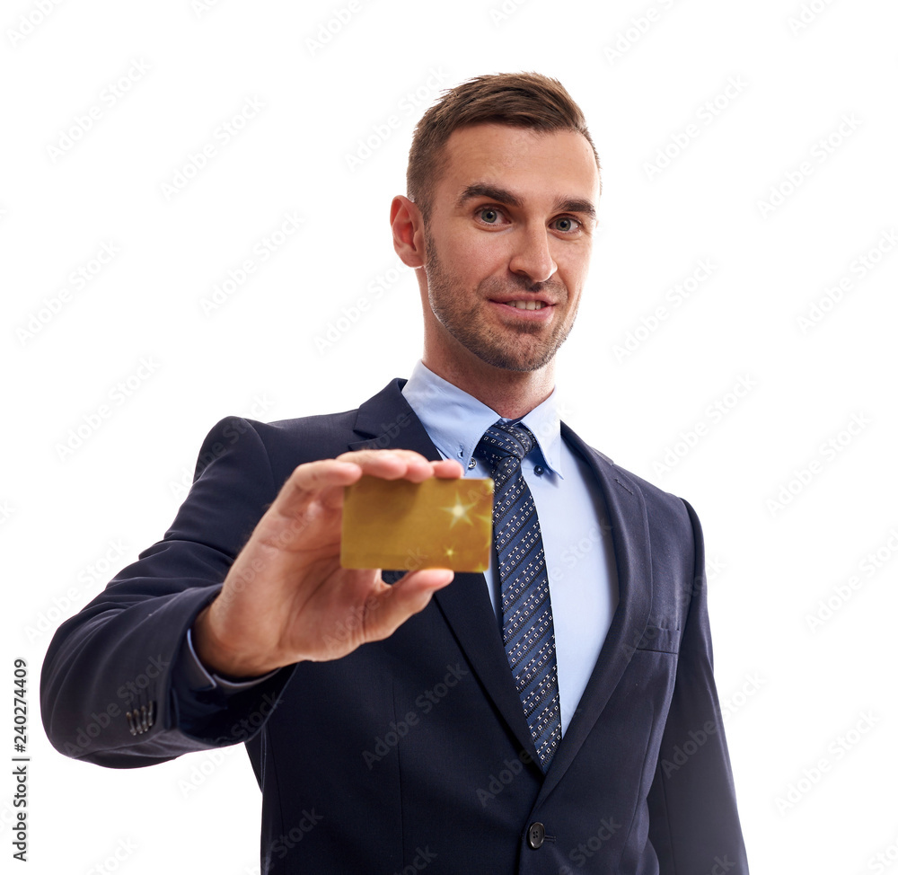 Happy smiling young man showing credit card isolated on white background Happy smiling young man showing credit card isolated on white background