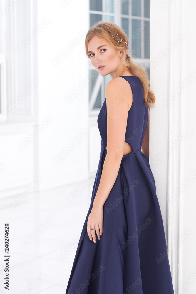 beautiful woman model posing in elegant dress in the studio beautiful woman model posing in elegant dress in the studio