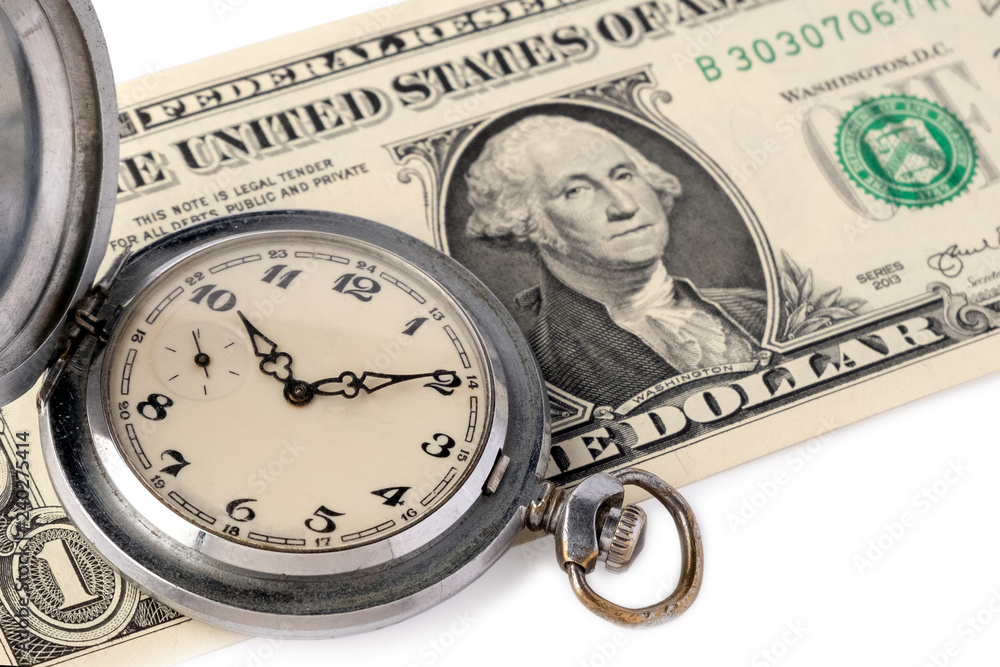 Close-up of an old pocket watch with scratches lie on a one-dollar bill of the USA with a portrait of Washington. The concept of time is money and effective time management. Advertising watchmaking. Close-up of an old pocket watch with scratches lie on a one-dollar bill of the USA with a portrait of Washington. The concept of time is money and effective time management. Advertising watchmaking.