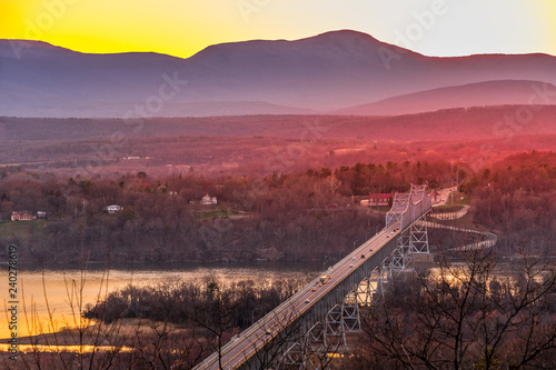 Rip Van Winkle Bridge facing west at sunset on a clear spring day.