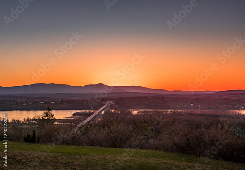 Rip Van Winkle Bridge facing west at sunset on a clear spring day.
