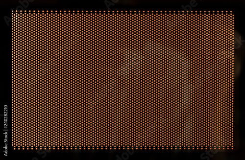 Grid on a microwave oven door. Texture. Closeup. 
