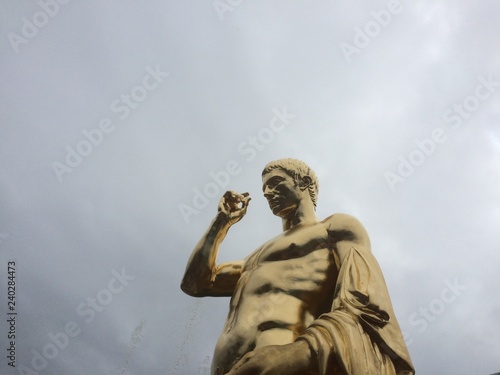 golden statue of a man