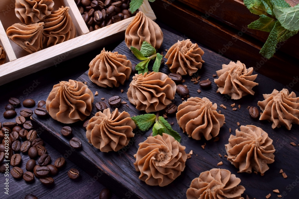 Coffee creamy fudge on a dark wooden board Coffee creamy fudge on a dark wooden board