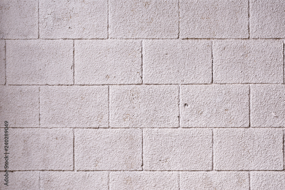 Obraz premium gray concrete wall with brick pattern, texture