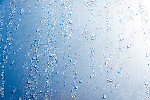 Blue drop of water drops background