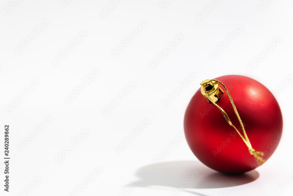 Red Christmas ball on a white background Red Christmas ball on a white background