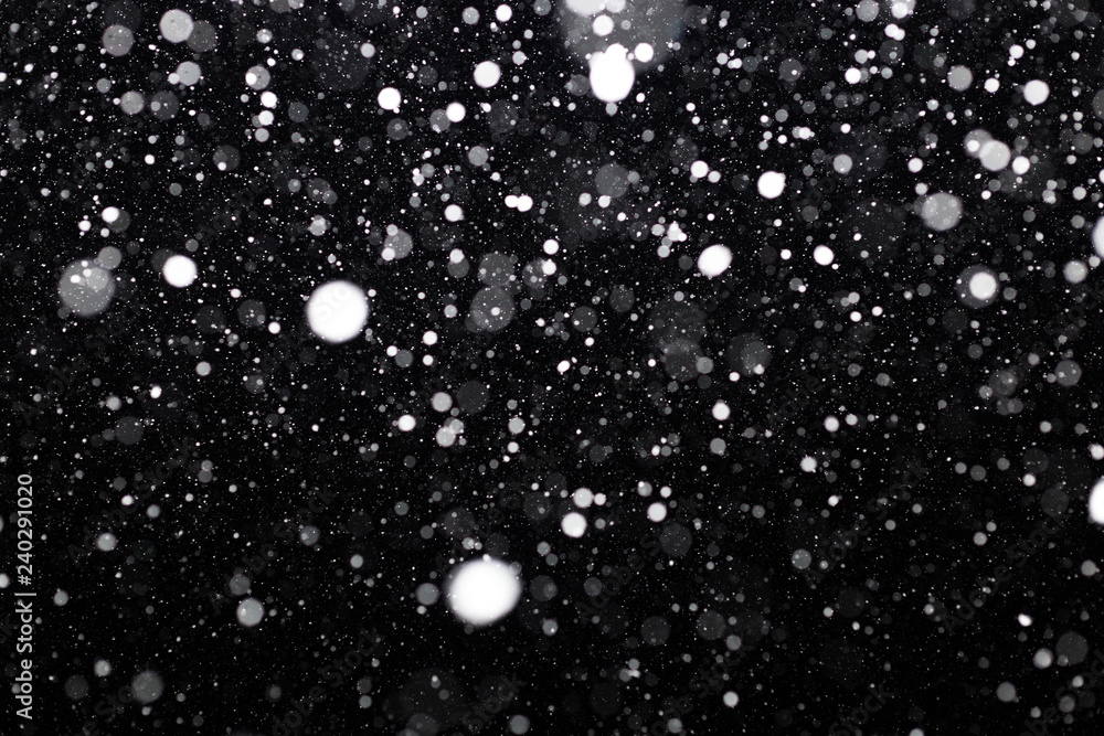 Snowfall on black background Snowfall on black background