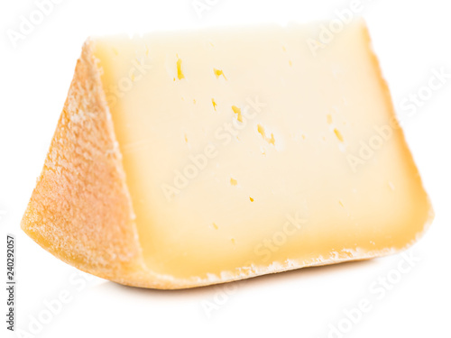 Piece of natural hard cheese isolated