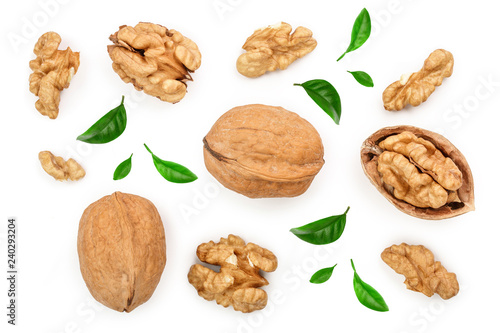 Walnuts with leaf isolated on white background. Top view. Flat lay